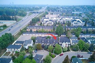 Photo 3: 2 Somme Mews SW in Calgary: Garrison Woods Row/Townhouse for sale : MLS®# A2051918