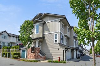 Photo 1: 204 2450 161A Street in Surrey: Grandview Surrey Townhouse for sale in "GLENMORE" (South Surrey White Rock)  : MLS®# R2277039