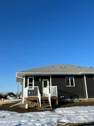 Photo 3: 6301 58A Street: Rocky Mountain House Semi Detached (Half Duplex) for sale : MLS®# A2109083