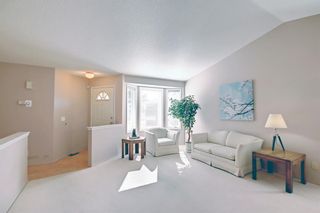 Photo 3: 297 Arbour Cliff Close NW in Calgary: Arbour Lake Semi Detached (Half Duplex) for sale : MLS®# A1255400