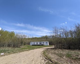 Photo 1: 13661 ROSE PRAIRIE Road in Fort St. John: Fort St. John - Rural W 100th Manufactured Home for sale : MLS®# R2693602