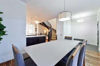 Photo 3: 517 14 Avenue NE in Calgary: Renfrew Semi Detached (Half Duplex) for sale : MLS®# A2032562