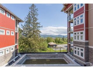 Photo 2: 315 2238 WHATCOM Road in Abbotsford: Abbotsford East Condo for sale in "WATERLEAF" : MLS®# R2165802