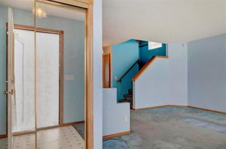 Photo 2: 254 SARATOGA Close NE in Calgary: Monterey Park House for sale : MLS®# C4165371