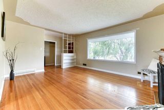 Photo 8: 560 Northmount Drive NW in Calgary: Cambrian Heights Detached for sale : MLS®# A2063090