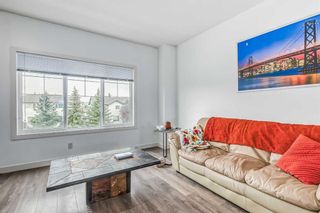 Photo 10: 2307 Jumping Pound Common: Cochrane Row/Townhouse for sale : MLS®# A2062848
