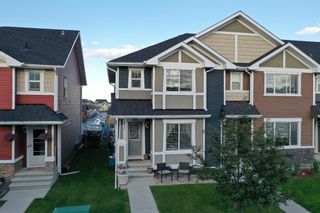 Photo 1: 199 Fireside Parkway: Cochrane Row/Townhouse for sale : MLS®# A1238005