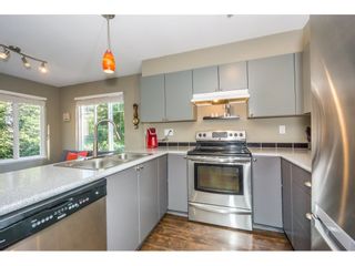 Photo 10: 8 12711 64TH Avenue in Surrey: West Newton Townhouse for sale in "Palette on the Park" : MLS®# R2200679