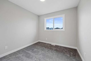 Photo 16: 84 Belmont Green SW in Calgary: Belmont Detached for sale : MLS®# A2095377