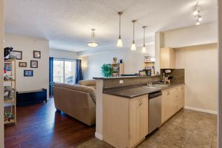 Photo 3: 1415 604 East Lake Boulevard NE: Airdrie Apartment for sale : MLS®# A1229561