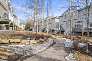 Photo 32: 76 Crystal Shores Cove: Okotoks Row/Townhouse for sale : MLS®# A1192998