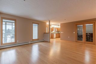 Photo 6: 214 7239 SIERRA MORENA Boulevard SW in Calgary: Signal Hill Apartment for sale : MLS®# C4282554