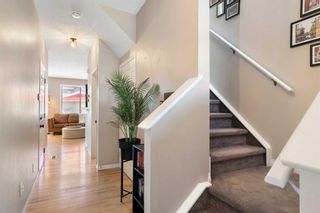 Photo 3: 8 Everridge Gardens SW in Calgary: Evergreen Row/Townhouse for sale : MLS®# A2130075
