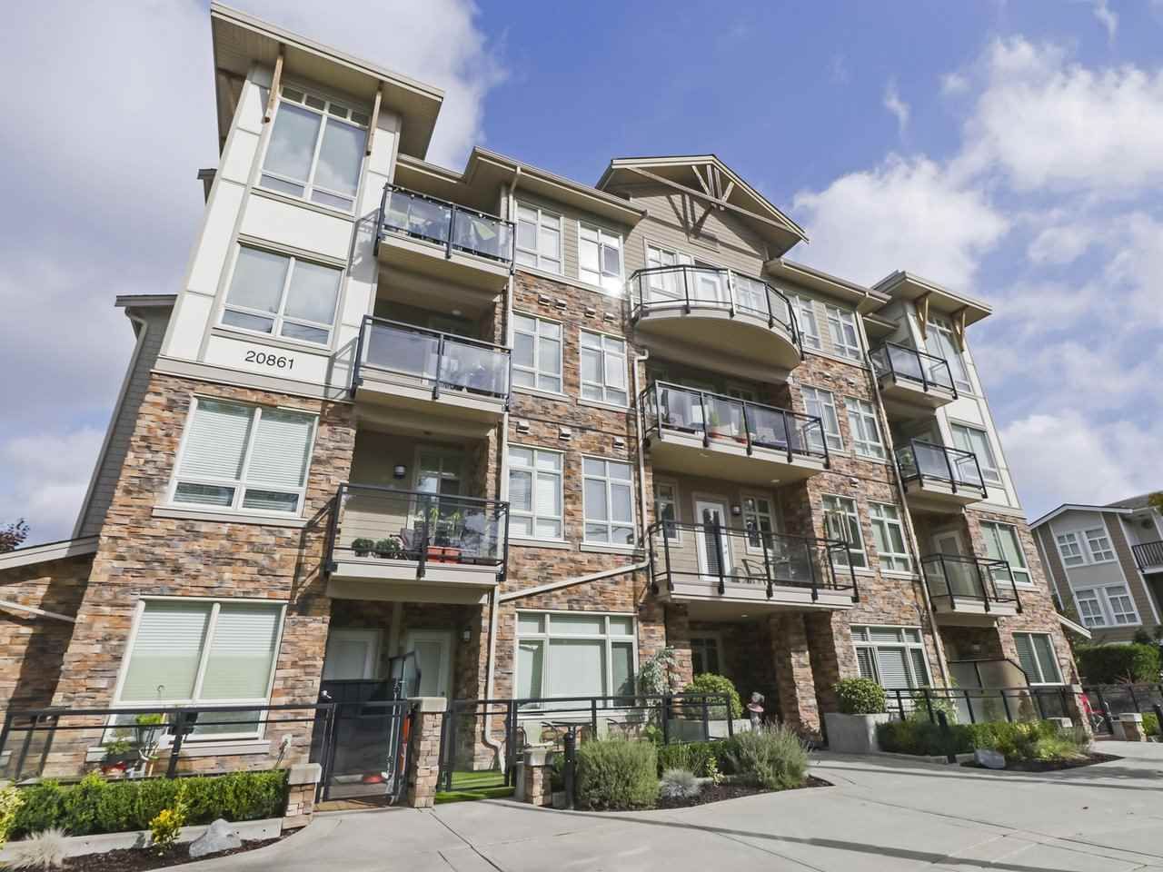 Main Photo: 210 20861 83 Avenue in Langley: Willoughby Heights Condo for sale in "ATHENRY GATE" : MLS®# R2408736