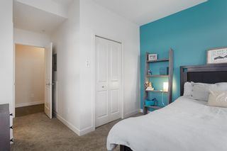 Photo 13: 211 25 Auburn Meadows Avenue SE in Calgary: Auburn Bay Apartment for sale : MLS®# A1214157