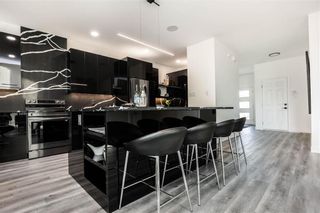 Photo 4: 77 Goodman Drive in Winnipeg: Highland Pointe Residential for sale (4E)  : MLS®# 202226660