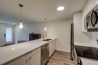 Photo 3: 127 Panatella Square NW in Calgary: Panorama Hills Row/Townhouse for sale : MLS®# A2127980