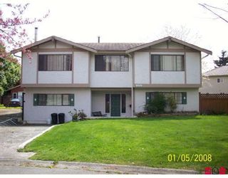 Photo 1: 12776 ROSS Place in Surrey: Queen Mary Park Surrey House for sale in "Robertson Park" : MLS®# F2813332