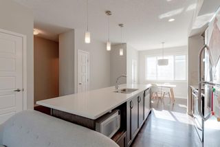 Photo 9: 107 Panatella Walk NW in Calgary: Panorama Hills Row/Townhouse for sale : MLS®# A1190534