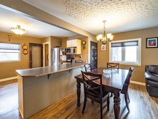 Photo 8: 105 Hudson Road NW in Calgary: Highwood Detached for sale : MLS®# A1074029