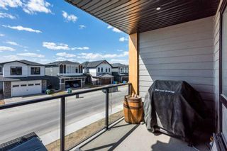 Photo 17: 215 7820 Spring Willow Drive SW in Calgary: Springbank Hill Row/Townhouse for sale : MLS®# A2126081