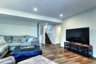 Photo 16: 36 Coach Manor Rise SW in Calgary: Coach Hill Detached for sale : MLS®# A1243822