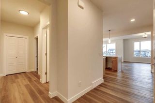 Photo 4: 217 Creekstone Path SW in Calgary: C-168 Detached for sale : MLS®# A2112737