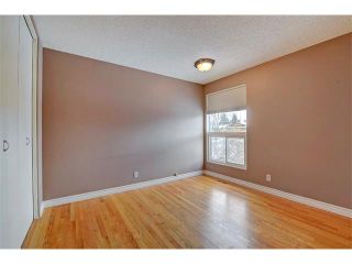 Photo 17: 6415 LONGMOOR Way SW in Calgary: Lakeview House for sale : MLS®# C4102401