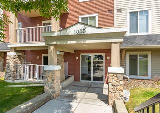 Photo 2: 1211 70 Panamount Drive NW in Calgary: Panorama Hills Apartment for sale : MLS®# A2054811