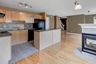 Photo 13: 180 Simcoe Place SW in Calgary: Signal Hill Row/Townhouse for sale : MLS®# A1218089