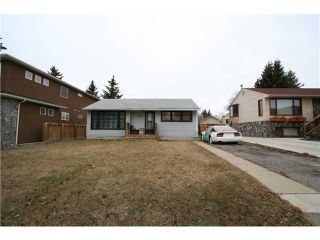 Photo 2: 1218 21 Avenue NW in CALGARY: Capitol Hill Residential Detached Single Family for sale (Calgary)  : MLS®# C3609794