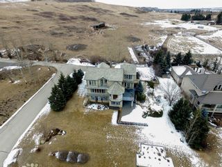 Photo 8: 219 Slopeview Drive SW in Calgary: Springbank Hill Detached for sale : MLS®# A1187658