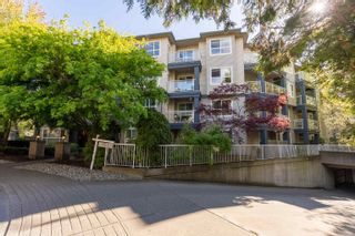 Photo 1: 307 8115 121A Street in Surrey: Queen Mary Park Surrey Condo for sale in "THE CROSSING" : MLS®# R2880084