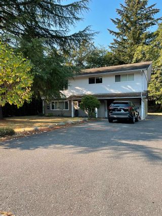 Photo 1: 4571 197A Street in Langley: Langley City House for sale : MLS®# R2730756