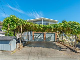 Photo 1: 2516 E 1ST Avenue in Vancouver: Renfrew VE House for sale (Vancouver East)  : MLS®# R2715221
