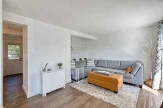 Photo 4: 615 21 Street NW in Calgary: West Hillhurst Semi Detached (Half Duplex) for sale : MLS®# A1256425