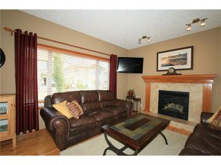 Photo 5: 18 WEST POINTE Manor: Cochrane House for sale : MLS®# C4072318