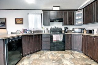Photo 11: 98 6220 17 Avenue SE in Calgary: Red Carpet Mobile for sale : MLS®# A1226464