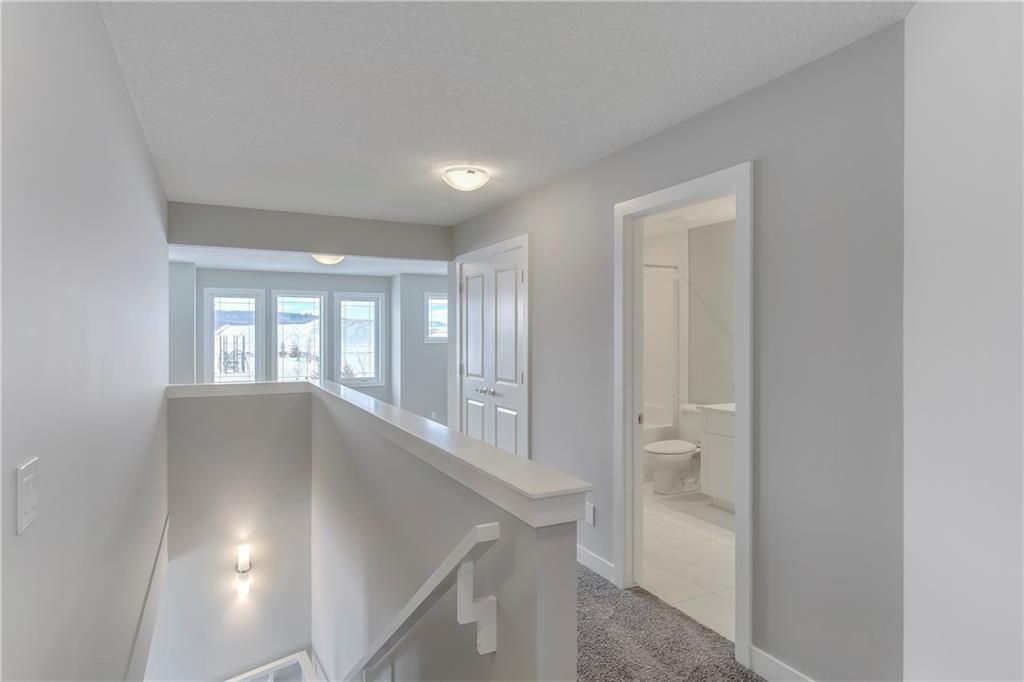 Photo 26: Photos: 56 Creekside Green SW in Calgary: C-168 Detached for sale : MLS®# C4286836