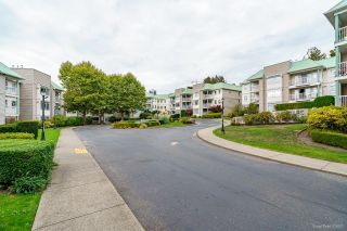 Photo 25: 201 9767 140 Street in Surrey: Whalley Condo for sale in "Fraser Gate" (North Surrey)  : MLS®# R2816984