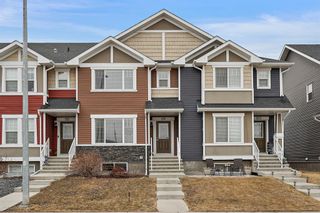 Photo 1: 119 Fireside Parkway: Cochrane Row/Townhouse for sale : MLS®# A2027901