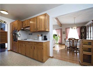 Photo 6: 3112 LANCASTER Way SW in Calgary: Lakeview House for sale : MLS®# C3654230