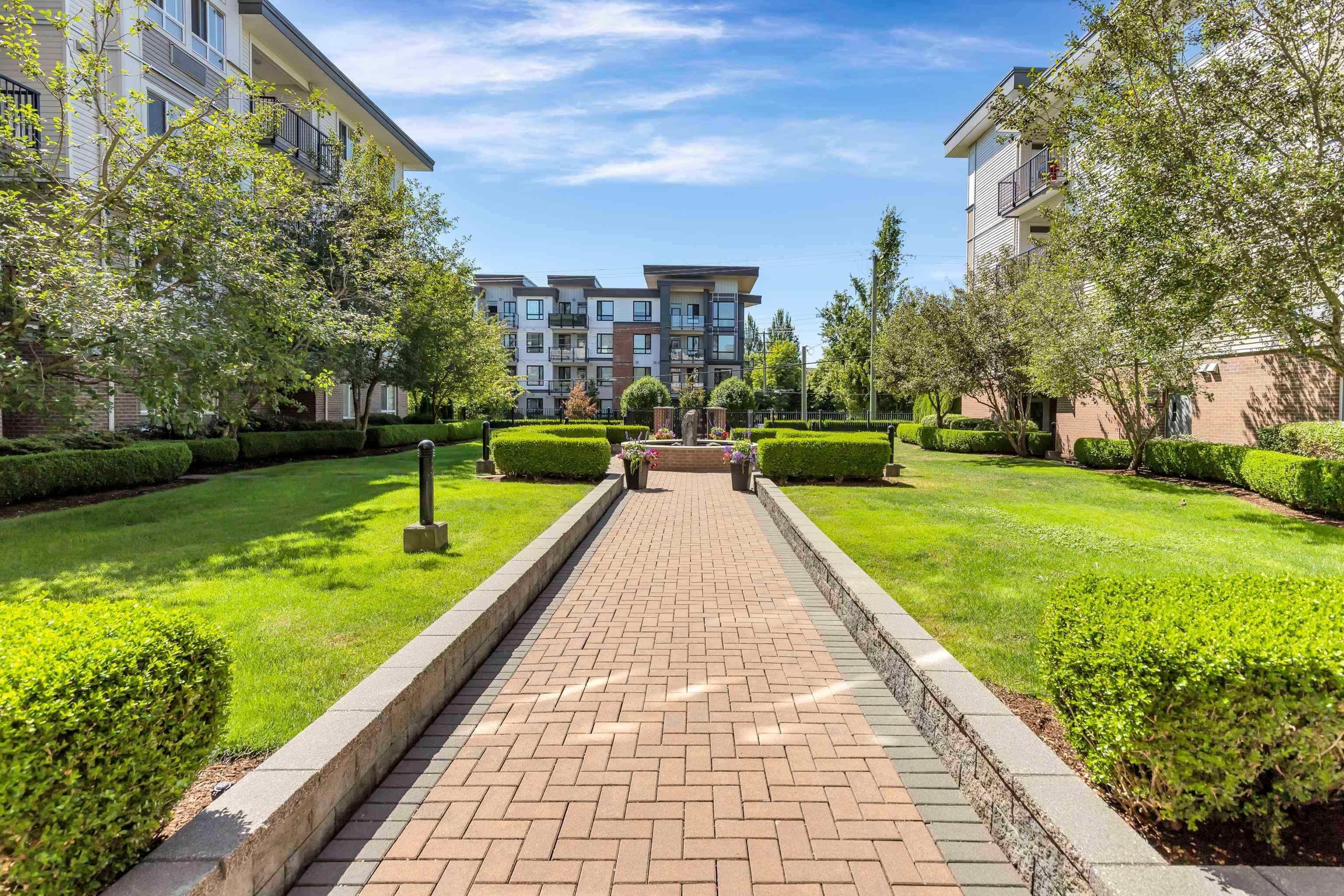 Main Photo: 415 5430 201 Street in Langley: Langley City Condo for sale in "Sonnet" : MLS®# R2836478