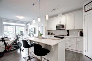 Photo 4: 104 20 Walgrove Walk SE in Calgary: Walden Apartment for sale : MLS®# A1255044