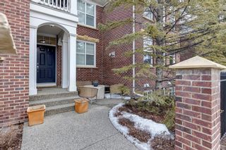 Photo 2: 4 10 St Julien Drive SW in Calgary: Garrison Woods Row/Townhouse for sale : MLS®# A2037462