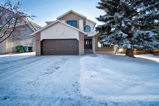 Photo 1: 214 Edgeview Drive NW in Calgary: Edgemont Detached for sale : MLS®# A2014257