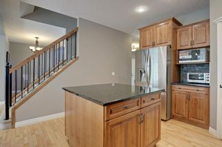 Photo 12: 145 TREMBLANT Place SW in Calgary: Springbank Hill Detached for sale : MLS®# A1024099