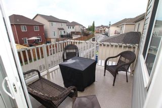 Photo 24: 976 Windsong Drive SW: Airdrie Row/Townhouse for sale : MLS®# A1235668