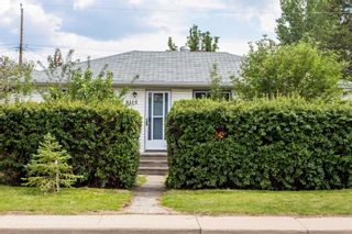 Photo 1: 8115 43 Avenue NW in Calgary: Bowness Detached for sale : MLS®# A2063329