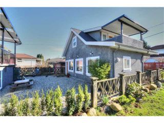 Photo 3: 3102 E 4TH Avenue in Vancouver: Renfrew VE House for sale in "RENFREW" (Vancouver East)  : MLS®# V1106704